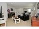 Finished basement boasting a dark leather sofa, wet bar, mini fridge, and tv at 13616 Whitten N Dr, Fishers, IN 46037