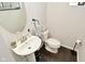 Bathroom featuring a pedestal sink, modern fixtures, and neutral decor at 13616 Whitten N Dr, Fishers, IN 46037