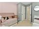 Bedroom featuring a crib and access to the closet at 13616 Whitten N Dr, Fishers, IN 46037