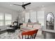 Inviting living room with neutral tones, plush seating, and abundant natural light at 13616 Whitten N Dr, Fishers, IN 46037