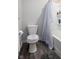 Bathroom featuring a toilet, shower with shower curtain, and neutral paint at 14110 Bay Willow Dr, Fishers, IN 46037