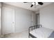 Bedroom featuring a bed with a black frame, carpet, and natural light at 14110 Bay Willow Dr, Fishers, IN 46037
