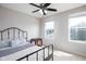 Bedroom featuring a bed with a black frame and a ceiling fan at 14110 Bay Willow Dr, Fishers, IN 46037