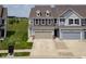 Aerial view of a charming home featuring a spacious two-car garage and manicured lawn at 14110 Bay Willow Dr, Fishers, IN 46037