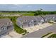 Charming townhomes feature a craftsman-style design, attached garages, and well-maintained landscaping at 14110 Bay Willow Dr, Fishers, IN 46037