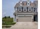 Charming two-story home with a neutral color palette and a spacious two-car garage at 14110 Bay Willow Dr, Fishers, IN 46037