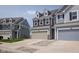 Charming home featuring a spacious two-car garage, manicured lawn, and inviting curb appeal at 14110 Bay Willow Dr, Fishers, IN 46037