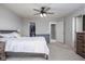 Spacious main bedroom with neutral carpeting and walk-in closet at 14110 Bay Willow Dr, Fishers, IN 46037