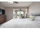 Bright main bedroom features an adjacent office space and neutral decor at 14110 Bay Willow Dr, Fishers, IN 46037