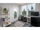 Bright office with laminate floors, shelving, and a window providing ample natural light at 14110 Bay Willow Dr, Fishers, IN 46037