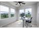 Home office boasts three large windows, providing ample natural light and views at 14110 Bay Willow Dr, Fishers, IN 46037