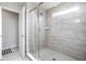 Clean walk-in shower with sleek tile and glass door at 14110 Bay Willow Dr, Fishers, IN 46037