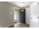 View of the home's entryway showing the front door, coat closet, and light-toned floors at 14255 Holly Berry Cir, Fishers, IN 46038