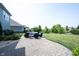 Stone patio in backyard featuring a fire pit with comfortable seating, ideal for relaxation and entertainment at 14982 Dawnhaven Dr, Westfield, IN 46074