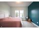 Bright bedroom with modern accents, large windows, and warm color palette at 14982 Dawnhaven Dr, Westfield, IN 46074