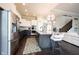 Modern kitchen features a large island with seating, stainless appliances, and a gourmet gas range at 14982 Dawnhaven Dr, Westfield, IN 46074