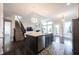 Spacious kitchen with a large island, stainless steel appliances, and open concept to living area at 14982 Dawnhaven Dr, Westfield, IN 46074