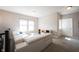 Bright living room featuring a stylish sectional sofa and plenty of natural light at 14982 Dawnhaven Dr, Westfield, IN 46074