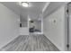 Finished basement featuring gray wood floors and white walls at 1504 Mcclure Rd, Columbus, IN 47201
