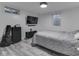 Well-lit bedroom with stylish accents and LVP flooring at 1504 Mcclure Rd, Columbus, IN 47201