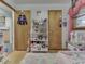 bedroom with a toy shelf and door to another room at 1504 Mcclure Rd, Columbus, IN 47201