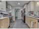 Updated kitchen with new countertops and modern appliances at 1504 Mcclure Rd, Columbus, IN 47201