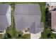 An aerial view of the house showing the roof, landscaping, and surrounding neighborhood at 15879 Viking Commander Way, Westfield, IN 46074