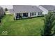 Spacious backyard featuring a covered patio ideal for outdoor entertaining and relaxation at 15879 Viking Commander Way, Westfield, IN 46074