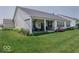 Backyard patio with covered seating area, offering a perfect spot for outdoor enjoyment at 15879 Viking Commander Way, Westfield, IN 46074