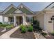 Charming front exterior with manicured landscaping and inviting entrance at 15879 Viking Commander Way, Westfield, IN 46074