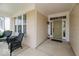 Inviting front porch with stylish seating and a well-maintained entryway at 15879 Viking Commander Way, Westfield, IN 46074
