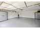 Clean, organized garage with epoxy flooring and storage cabinets at 15879 Viking Commander Way, Westfield, IN 46074