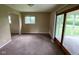Spacious dining room with sliding glass doors leading to the backyard patio at 1749 N Graham Ave, Indianapolis, IN 46218