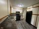 Modern kitchen featuring black appliances, plenty of storage, and neutral colored walls at 1749 N Graham Ave, Indianapolis, IN 46218