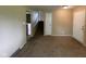 View of the interior showcasing staircase and multiple doorways and neutral colored walls at 1749 N Graham Ave, Indianapolis, IN 46218