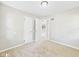 Bedroom featuring neutral carpet and an open doorway at 220 Central Ave, Anderson, IN 46012