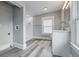 Open bathroom space featuring grey walls, modern vanity, and walk in shower at 2896 Sutherland Ave, Indianapolis, IN 46205