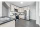 Modern kitchen features stainless steel appliances and light wood cabinets at 2896 Sutherland Ave, Indianapolis, IN 46205