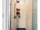 Modern shower with neutral colored brick-style tiles and stainless steel fixtures at 2928 Mounds Rd, Anderson, IN 46016