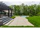 Beautiful backyard featuring a pool, patio, and lush landscaping, perfect for outdoor entertaining at 3549 W 131St St, Carmel, IN 46032