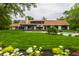 Expansive backyard with lush green lawn, swimming pool, and covered patio offers serene outdoor living at 3549 W 131St St, Carmel, IN 46032