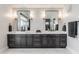 Bathroom with dual sinks, modern fixtures, and a large mirror for a luxurious feel at 3549 W 131St St, Carmel, IN 46032
