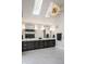 A bright bathroom features dual sinks, modern lighting, and large mirrors, creating a luxurious atmosphere at 3549 W 131St St, Carmel, IN 46032