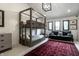 Spacious bedroom features a cozy bunkbed, sofa, three windows and a red rug at 3549 W 131St St, Carmel, IN 46032