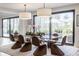 Bright dining room featuring modern chairs and a glass table with outdoor views at 3549 W 131St St, Carmel, IN 46032