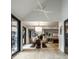 Dining room showcasing a glass table, modern lighting and an open floorplan at 3549 W 131St St, Carmel, IN 46032