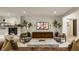 Chic living space featuring a fireplace, stylish decor, and hardwood floors for a modern and inviting atmosphere at 3549 W 131St St, Carmel, IN 46032