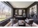 Well-lit home office featuring a large window, stylish decor, and comfortable seating at 3549 W 131St St, Carmel, IN 46032