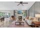 Spacious living room featuring a fireplace, comfortable seating, and an open layout at 3571 S Cedar Creek Ln, New Palestine, IN 46163