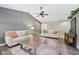 Well-appointed living room with modern furnishings and an open flow to dining area at 3571 S Cedar Creek Ln, New Palestine, IN 46163